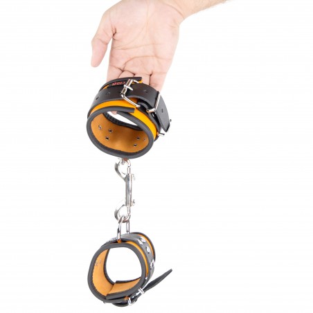 Menottes Poignets Cuir Noir Fin Non Rembourré - Liseré Et Intérieur Orange - Mousqueton Métal - Ø 21 A 32 cm / 6,5 cm - The Red